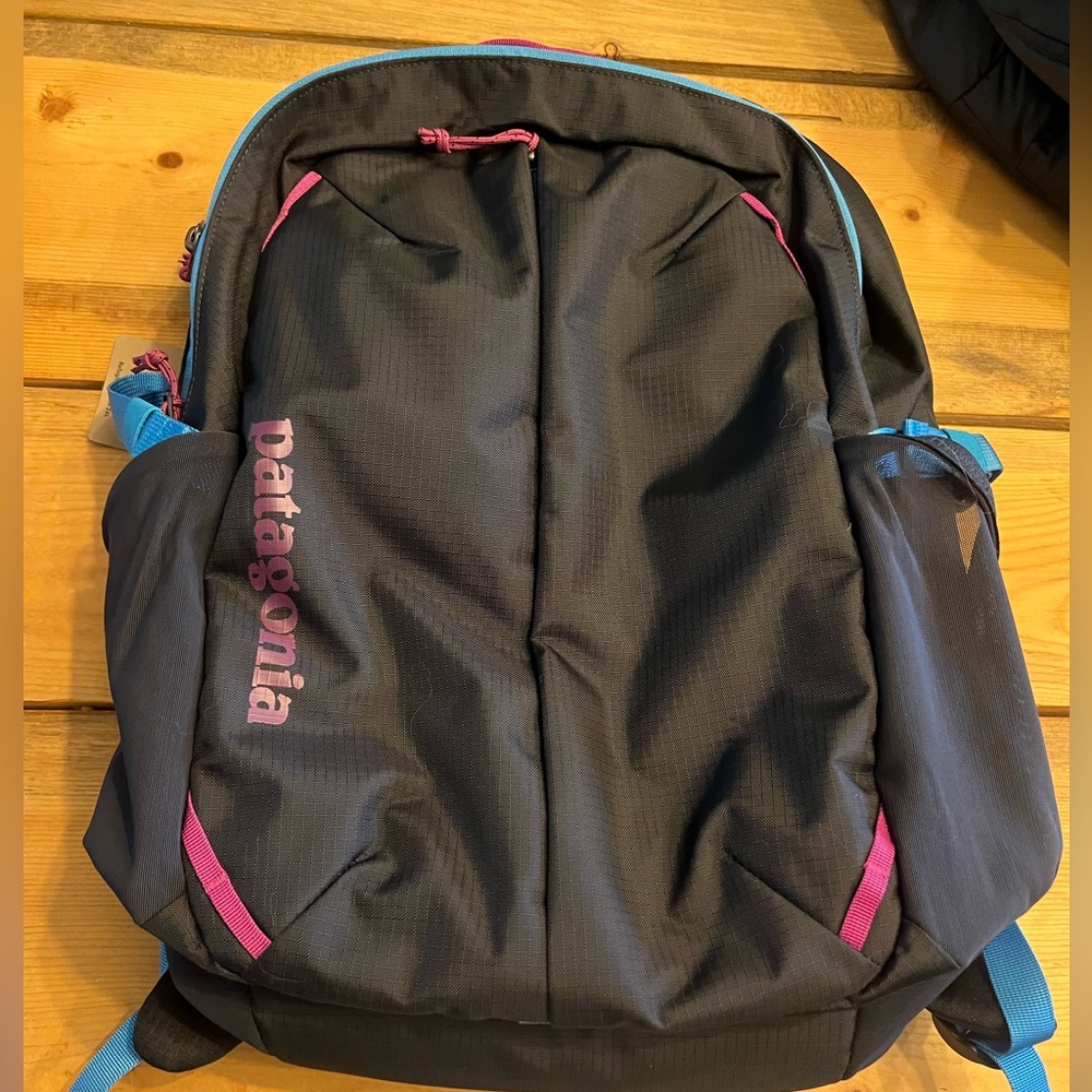 Patagonia Black Backpack with Pink and Blue Accents